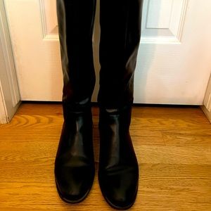 Black knee high boots with gold studs